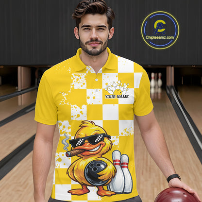 A man wearing a yellow and white checkered bowling-themed polo shirt with a cartoon duck graphic, standing in a bowling alley holding a bowling ball. A circular 'Chipleamz.