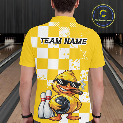 A person viewed from behind wearing a bright yellow bowling-themed short-sleeve shirt with a white checkerboard pattern, 'TEAM NAME' printed across the upper back, and a cartoon duck holding bowling pins and a bowling ball with sunglasses and a cigar. Bowling lanes are visible in the background, and a circular 'Chipteamz.