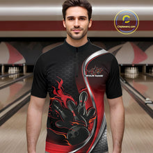 Load image into Gallery viewer, Male model front view at bowling lane wearing black and red quarter zip shirt with flame bowling action dynamic artwork