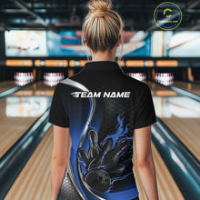 Load image into Gallery viewer, Female model back view at bowling lane wearing black and blue quarter zip shirt featuring flame bowling ball and pins action graphic