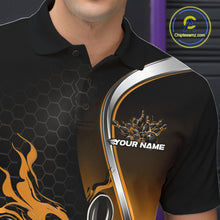Load image into Gallery viewer, Close-up view of the left chest area of a black and yellow bowling polo shirt showing a flame bowling ball and pins design detail.