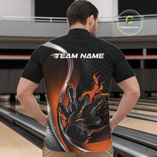 Load image into Gallery viewer, Male model front view at bowling lane wearing black and orange quarter zip shirt with flame bowling strike illustration and energetic design
