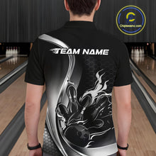 Load image into Gallery viewer, Male model seen from the back in a bowling lane wearing a black and gray polo shirt featuring a flame bowling ball and pins design in a dynamic sports scene.