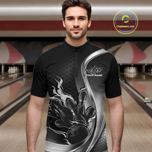 Load image into Gallery viewer, Male model front view at bowling lane wearing black and gray quarter zip shirt with flame bowling ball hitting pins design