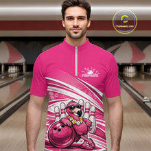 Load image into Gallery viewer, Male model wearing a pink bowling quarter-zip shirt at a bowling lane with a tropical flamingo in sunglasses beside a bowling ball.
