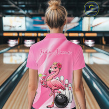 Load image into Gallery viewer, Back view of a female model in a bowling center wearing a pink quarter-zip shirt featuring flamingo-themed bowling artwork and hibiscus flowers.