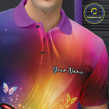 Load image into Gallery viewer, Close-up left chest view of a bowling polo shirt featuring a rainbow butterfly beside a bowling ball with scattered bowling pins.