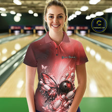 Load image into Gallery viewer, Female model at a bowling lane wearing a red bowling polo shirt with butterfly artwork, a bowling ball, and scattered pin graphics.
