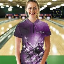 Load image into Gallery viewer, Female model at a bowling lane wearing a purple quarter-zip bowling shirt with butterfly artwork, a bowling ball, and scattered pin graphics.