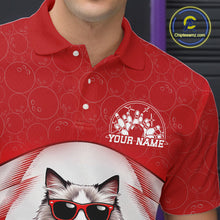 Load image into Gallery viewer, Close-up left chest detail of a white and red bowling polo shirt featuring a ragdoll cat wearing sunglasses and leaning on a bowling ball.