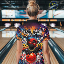 Load image into Gallery viewer, Back view of a female model in a bowling venue wearing a colorful quarter-zip shirt featuring a black cat, sunglasses, backward cap, and bowling ball artwork.