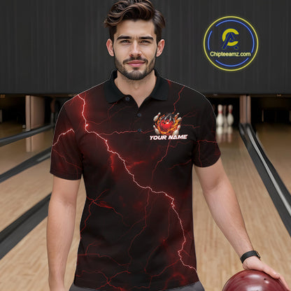 Male model at the bowling lane wearing a black and red bowling polo with dragon claw artwork and fiery bowling graphics.