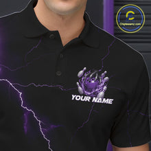 Load image into Gallery viewer, Close-up of the left chest on a black and purple bowling polo featuring a dragon claw and flaming bowling ball motif.