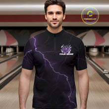 Load image into Gallery viewer, Male model wearing a black and purple quarter-zip in a bowling alley with dragon claw artwork and fiery bowling graphics.