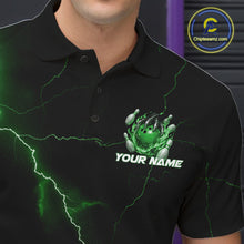 Load image into Gallery viewer, Left chest close-up of a black and green bowling polo featuring a dragon claw gripping a flaming bowling ball.