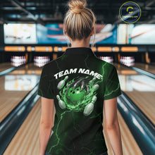Load image into Gallery viewer, Back view of a black and green womens bowling polo showcasing a flaming bowling ball and dragon claw motif.