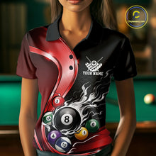 Load image into Gallery viewer, Front view of a female model in a black and red billiard polo with metallic ribbons, dark honeycomb graphics, and a flaming 8-ball