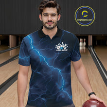 Load image into Gallery viewer, Male model wearing a bowling polo in a bowling alley with blue cobra artwork surrounding a bowling ball.