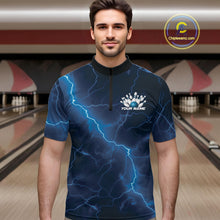 Load image into Gallery viewer, Male model wearing a bowling quarter-zip in a bowling center with blue cobra artwork surrounding a bowling ball and scattered pins.