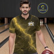 Load image into Gallery viewer, Male model at the bowling lane wearing a bowling polo with yellow cobra graphics and bowling-themed accents.