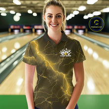 Load image into Gallery viewer, Female model at the bowling lane wearing a bowling polo with yellow cobra artwork and bowling-themed graphics.