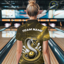 Load image into Gallery viewer, Back view of a womens bowling polo displaying a yellow cobra wrapped around a bowling ball with scattered pins.