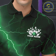 Load image into Gallery viewer, Close-up left chest detail of a bowling polo featuring a green cobra coiled around a bowling ball with scattered pins.