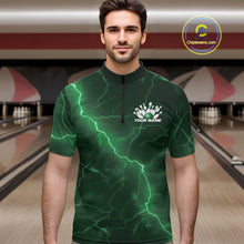 Load image into Gallery viewer, Male model wearing a bowling quarter-zip with green cobra artwork and lightning fantasy accents in a bowling lane.