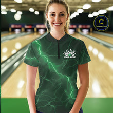 Load image into Gallery viewer, Female model wearing a bowling quarter-zip with green cobra, bowling ball, pins, and lightning accents in a bowling lane.