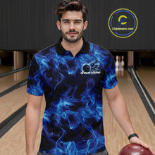 Load image into Gallery viewer, Male model wearing a blue bowling polo in a bowling lane with fiery bowling ball graphics and bold flame details.