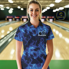 Load image into Gallery viewer, Female model in a bowling center wearing a blue bowling polo with blazing bowling ball graphics.