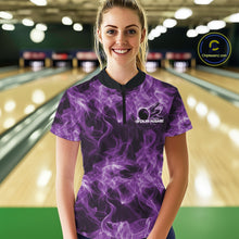 Load image into Gallery viewer, Female model wearing a purple bowling quarter-zip at the bowling lane with fiery bowling ball graphics.