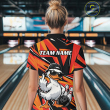 Load image into Gallery viewer, Back view of a black and orange womens bowling quarter-zip displaying duck graphics with bowling-inspired details.