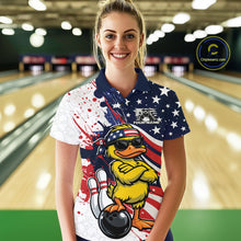 Load image into Gallery viewer, Front view of a female model in a bowling alley wearing a bowling polo with patriotic duck artwork and bowling ball accents.