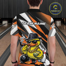 Load image into Gallery viewer, Back view of a black and orange bowling polo displaying a duck wearing sunglasses and fedora beside a bowling ball.