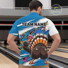 Load image into Gallery viewer, Back view of a male model wearing a blue custom quarter zip bowling shirt with a funny graffiti turkey holding a bowling ball, paint splatter accents in a bowling alley.