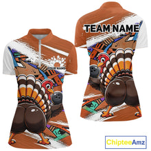 Load image into Gallery viewer, Front and back views of an orange custom women's quarter zip bowling shirt featuring a funny graffiti turkey holding a bowling ball, paint splatter accents, and a personalized name.