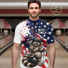 Load image into Gallery viewer, Male model in bowling lane wearing quarter-zip shirt with raccoon sunglasses and patriotic bandana artwork beside bowling ball