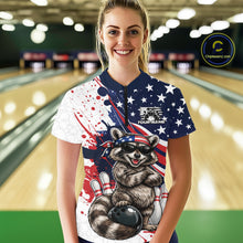 Load image into Gallery viewer, Front view female model in bowling lane wearing quarter zip shirt showcasing raccoon with sunglasses and patriotic bandana leaning on a bowling ball with fun bowling themed artwork.