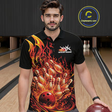 Load image into Gallery viewer, Male model wearing a black and red bowling polo in a bowling center with fiery bowling action scene graphics.