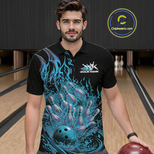 Load image into Gallery viewer, Male model in a bowling venue wearing a black and blue bowling polo decorated with blazing bowling strike artwork.