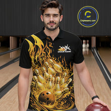 Load image into Gallery viewer, Front view of a male model at the bowling lane wearing a black and yellow polo with blazing bowling strike graphics.