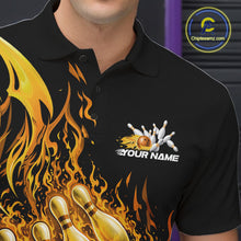 Load image into Gallery viewer, Left chest close-up of a black and yellow bowling polo highlighting a flaming bowling ball knocking down pins.