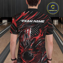 Load image into Gallery viewer, Back view of a male model in a bowling alley wearing a black and red polo shirt featuring a flaming bowling strike scene with patriotic styling.