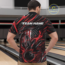 Load image into Gallery viewer, Front view of a male model in a bowling alley wearing a black and red quarter-zip shirt featuring a fiery bowling action scene.