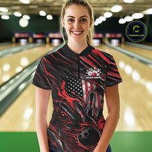 Load image into Gallery viewer, Female model in a bowling lane wearing black and red quarter zip shirt, front view showcasing patriotic flaming bowling ball hitting pins bold graphic design