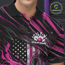 Load image into Gallery viewer, Close-up left chest view of a black and pink bowling polo shirt featuring a patriotic flaming bowling ball striking pins with flag-inspired details.