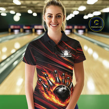 Load image into Gallery viewer, Female model at a bowling lane wearing a black and red-orange bowling polo shirt with flaming bowling strike artwork and dynamic stripes.