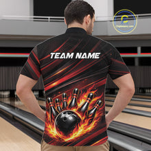 Load image into Gallery viewer, Front view of a male model in a bowling center wearing a black and red-orange quarter-zip shirt featuring a fiery bowling strike scene.