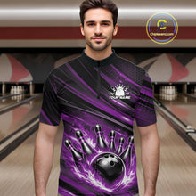 Load image into Gallery viewer, Male model at a bowling lane wearing a black and purple bowling quarter-zip shirt with fiery bowling strike artwork and bold stripe details.